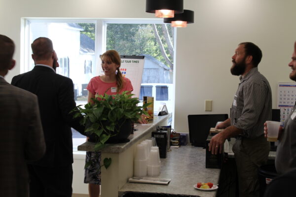 Andy McDonald, Operations, served as de facto bartender for the evening in the new reception area