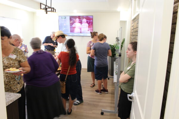 Food, drink, and a slideshow of the history of the business made the conference room a popular spot